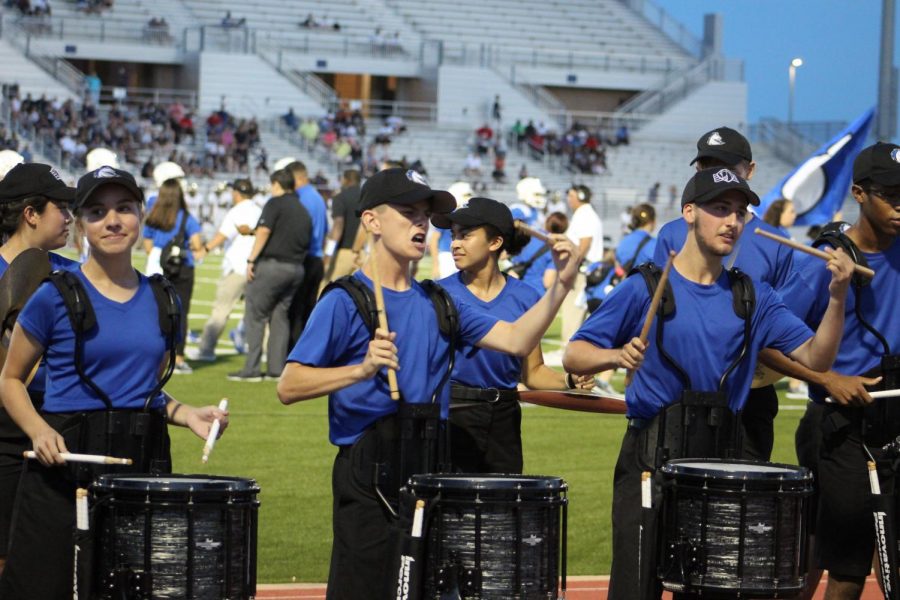 Drumline+performs+for+the+student+section+during+the+varsity+football+game+against+Klein+Collins+last+Saturday.