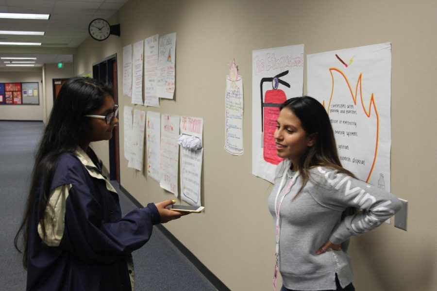 Fiza Kuzhiyil, reporter, talking to Alyssa Serna for Humans of Clear Springs.